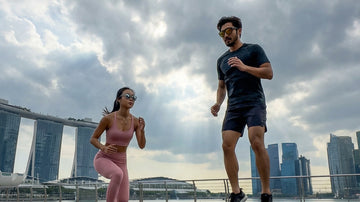 Two outdoor runners in Singapore wearing 2nu sunglasses, showing different frame fits for active urban use