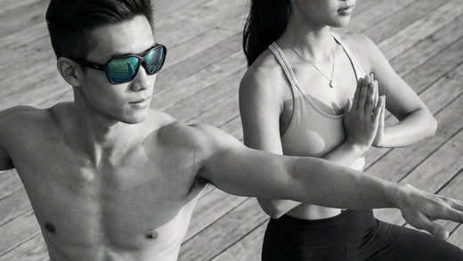 Two people wearing sports sunglasses during an outdoor fitness session