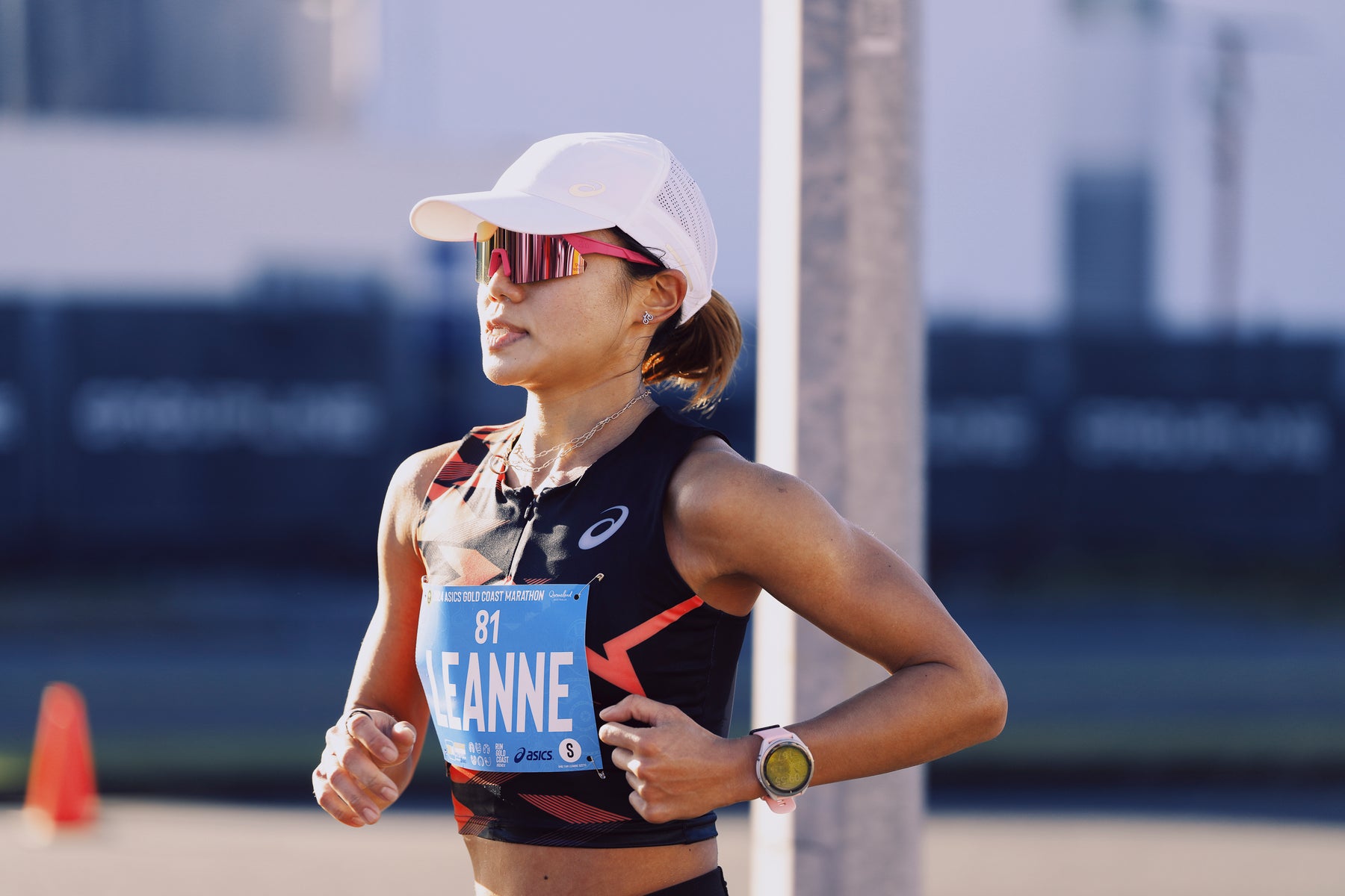 Runner wearing 2nu sunglasses on race day