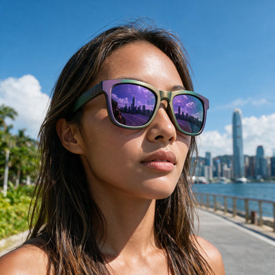 Woman wearing Fancy sunglasses with a hand-sprayed Purple Green frame and Purple Green Hexachroma lenses
