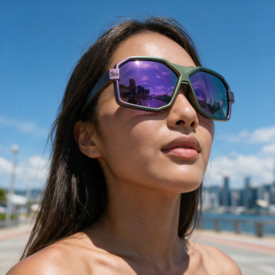 Woman wearing Zealot sunglasses with a hand-sprayed Purple Green frame and Purple Green Hexachroma lenses